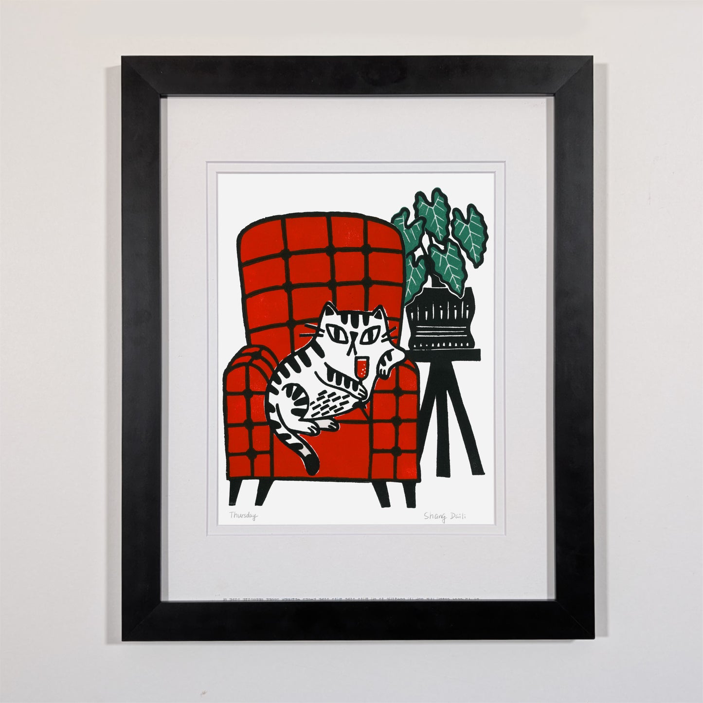 cat drinking wine on a red chair art print