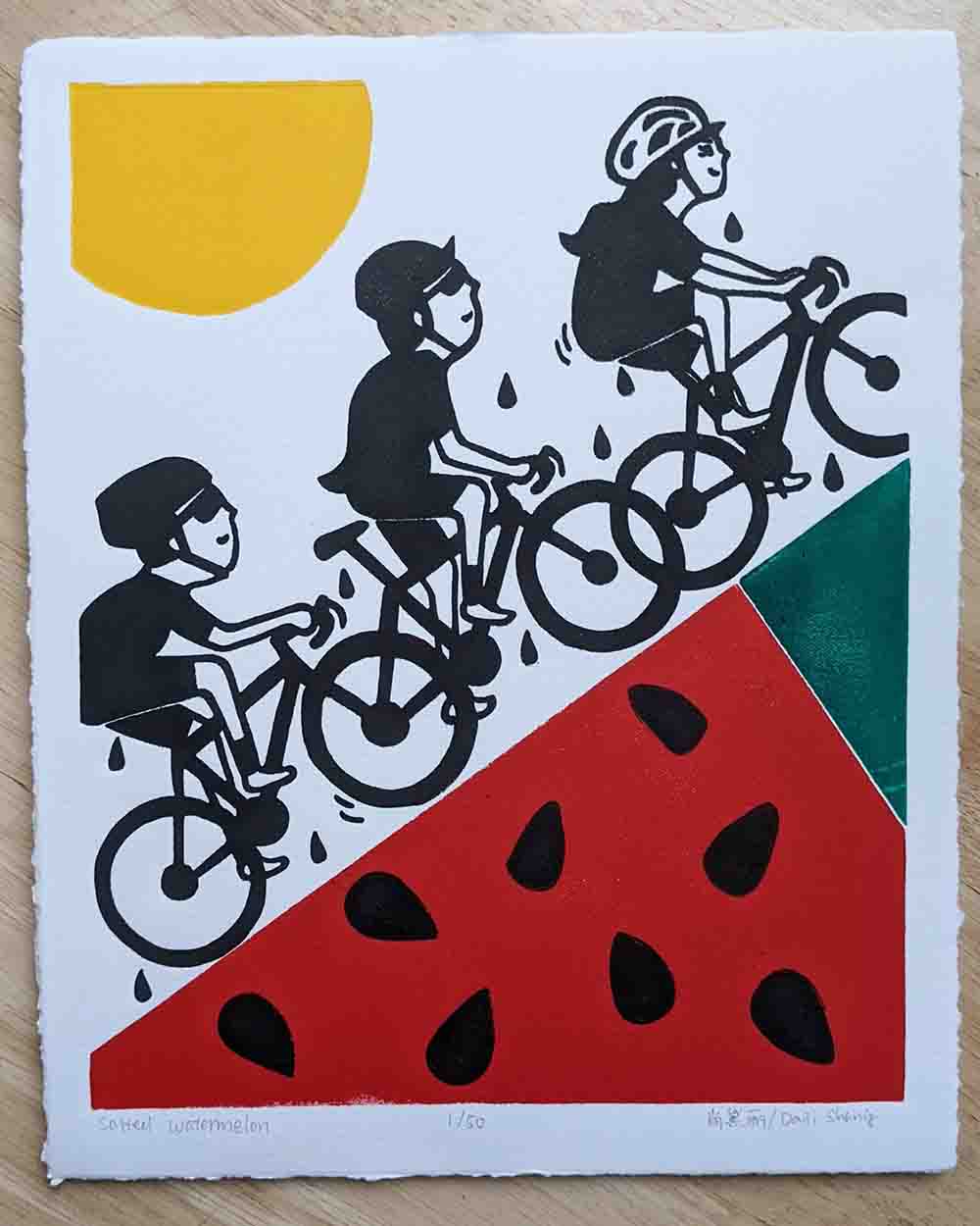 a row of cyclists riding on a watermelon